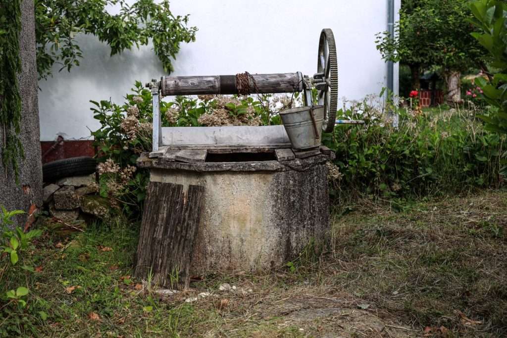 Well pump providing water access to a rural village