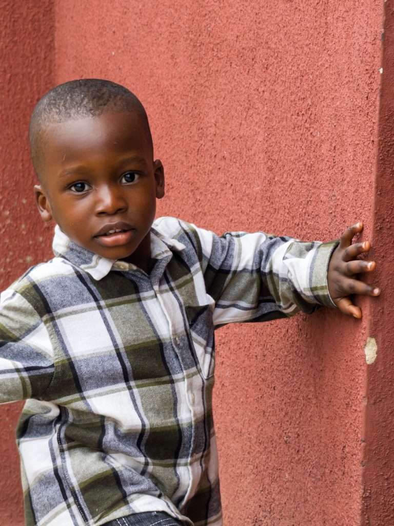 Close-up portrait of a smiling young boy